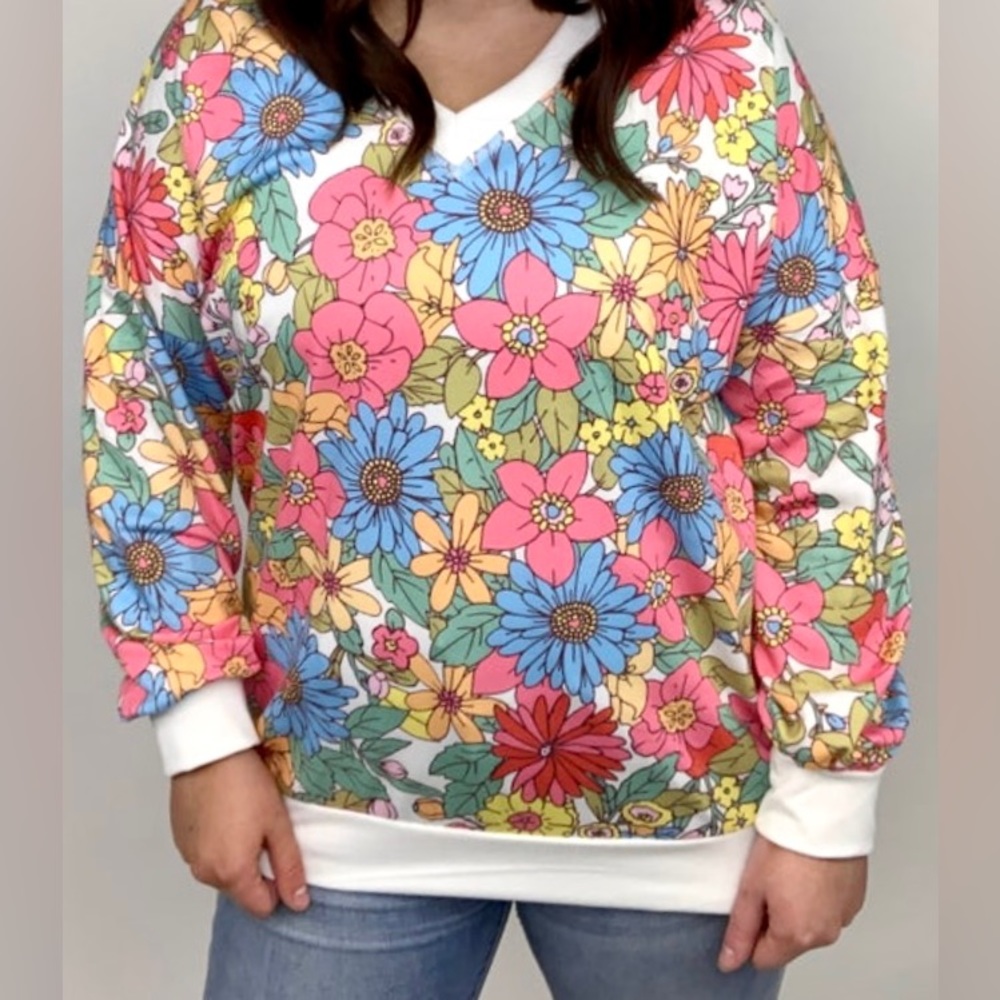 Beautiful flowered with white piping on the hem & sleeves Small from Love Melody